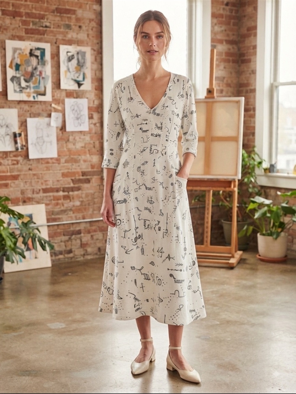 V-Neck White Midi Dress with Black Abstract Motif